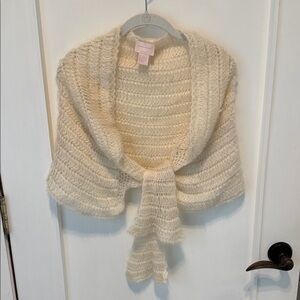 Central Park West mohair blend shrug/shawl is n loose knot creamy white.
